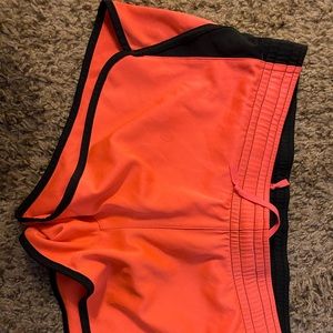 neon pink dry-fit nike shorts